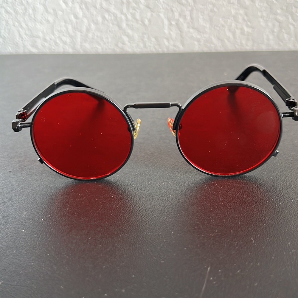 Round Red shades w/ metal frame.  Never used!  No scratches.